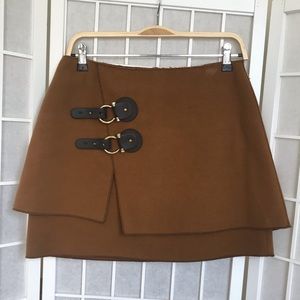 Gorgeous mini skirt with leather buckle detailing